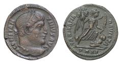 Ancient Coins - CONSTANTINE I. 307-337 AD. AE Follis (19mm, 2.72 gm). Arelate (Arles) mint. Struck 322/3 AD. Laureate bust right, seen from behind / SARMATIA DEVICTA,