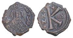 Ancient Coins - MAURICE TIBERIUS (582-602). AE21mm 5,6g Half Follis. Antioch. Crowned facing bust, wearing consular robe, holding mappa and eagle-tipped sceptre. Large K between
