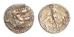 Ancient Coins - Sicily, Leontinoi, c. 450-440 BC. AR Litra (12mm, 0.7g). Head of roaring lion r. R/ River god, nude, standing l, pouring libation on altar from patera held in r. hand, and cradling