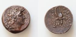 Ancient Coins - SELEUKID KINGS of SYRIA. Tryphon. c.142-138 BC. Æ (17mm, 5.4g, ). Antioch mint. Diademed head right / Spiked Macedonian helmet adorned with wild goat horns