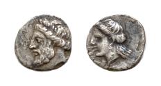 Ancient Coins - Greek AR Fractions  4,5mm 0,3g coin . Uncertain . Zeus ? Apollo ? Good very fine . Extremely rare