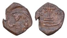 Ancient Coins - Manuel I Comnenus, AD 1143-1180. AE, Tetarteron. 3,2g. 17mm Thessalonica Cross crosslet set on three steps and flanked by IC – XC.