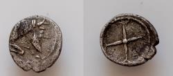Ancient Coins - Sicily, Gela, c. 480-470 BC. AR Litra (8.5mm, 0.60g). Forepart of bearded man-headed bull rushing r. R/ Four-spoked wheel.