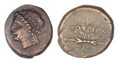 Ancient Coins - LUCANIA, Thourioi. Circa 280-213 BC. Æ (15mm, 3 g, ). Laureate head of Apollo left / Winged thunderbolt; monogram below. HN Italy 1927; SNG ANS – Good VF.