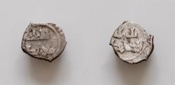 World Coins - FATIMID - al-Hakim, 996-1021 A.D., AR kharuba (1/16 dirham) 8mm 0.24g .Sicily. Very Fine Very rare