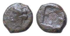 Ancient Coins - Sicily. Syracuse. Second Democracy 466-405 BC. Hemilitron Æ 17mm. 4,7g. head of Arethusa left, hair in sphendone / Sixteen-rayed star in centre