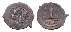 Ancient Coins - Justin II, with Sophia. 565-578. Æ decanummium. 2,8gm. 19,5mm. Theoupolis (Antioch) min . Justin and Sophia seated facing on double throne,
