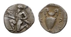 Ancient Coins - Islands off Thrace. Thasos 450-425 BC. Obol AR 11mm., 1g. Satyr kneeling left, holding kantharos with right hand  amphora. Extremely  fine
