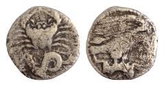 Ancient Coins - SICILY, Akragas. Circa 420-406 BC. AR Hemidrachm (15mm, 1.64g, ). Eagle standing right on, and tearing at, hare; barley grain to left / Crab below, ketos left with fish in its mouт