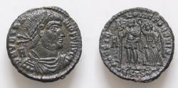 Ancient Coins - VETRANIO (Usurper, 350). AE23mm  5,6g. Silvered Follis  Siscia.  Vetranio standing left, holding labarum and sceptre, and being crowned by Victory to right