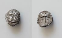 Ancient Coins - Islands of Troas, Tenedos, late 5th-early 4th century BC. AR Obol 8mm, 0.5g, . Janiform head, female on l., male on r. R/ Labrys within incuse square. BMC 14–21; HGC 6, 387.