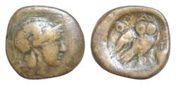 Ancient Coins - ATTICA, Athens. Circa 224/3-198 BC. Æ (21mm, 9 g, 6h). Helmeted head of Athena right / Owl standing right with wings displayed, head facing; amphora to right.