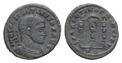 Ancient Coins - Constantine I (307/310-337). Æ Follis (22mm, 3.64g, ). Rome, 312-3. Laureate, draped and cuirassed bust r. R/ Aquila between two vexilla; RS. RIC VI 351a. Green patina Rare