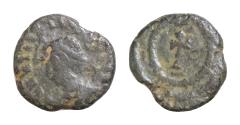 Ancient Coins - Migration Period VANDALS. Pseudo-Imperial coinage. Circa 440-490. AE9mm 0,7g  Obv: .....Diademed, draped, and cuirassed bust left.Cross within laurel-wreath