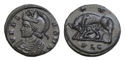 Ancient Coins - City Commemorative Æ 17mm. 2,9g  Struck under Constantine I. Lugdunum, AD 330-331. VRBS ROMA, helmeted bust of Roma to left, wearing imperial mantle She-wolf suckling Romulus and