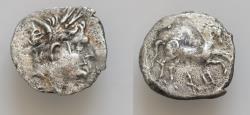 Ancient Coins - Sicily, Akragas AR 14mm 1,2g  Quarter Shekel ??. Punic occupation, 213-211 BC. Male head to right Triptolemos? wearing wreath of grain ears / Horse leaping to right, Punic ḤT belo
