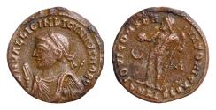 Ancient Coins - Licinius II. Caesar, AD 317-324. Æ Follis 18mm, 3g Alexandria mint, 2nd officina. Struck AD 317-320. Laureate bust left, wearing imperial mantle, holding mappa, globe, and scepter