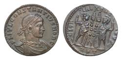 Ancient Coins - Constantius II, as Caesar, 324-337. Follis  18mm, 2g  Rome, 330. GLORIA EXERCITVS / RFT Two soldiers standing facing each other, each holding inverted spear