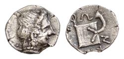 Ancient Coins - ILLYRO-PAEONIAN REGION, Damastion (Dardania). Circa 340-330 BC. AR Drachm (14mm, 3 g, ). Female head right, wearing stephanos, hair in sakkos / Portable ingot inscribed