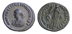 Ancient Coins - Licinius II. Caesar, AD 317-324. Æ Follis (18.5mm, 3.51g,). Cyzicus mint, Struck under Licinius I, AD 317-320. Laureate bust left, wearing imperial mantle, holding mappa, globe,
