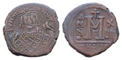 Ancient Coins - Maurice Tiberius. AD 582-602. Theoupolis (Antioch) Follis Æ 27mm., 11,26g. Garbled legend, crowned and mantled bust facing, trefoil or |/ pattern on crown, holding mappa and eagle-