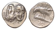Ancient Coins - MOESIA, Istros. Circa 4th Century BC. AR 18mm Drachm (5gm). Facing male heads, the right inverted / Sea-eagle left, grasping dolphin with talons
