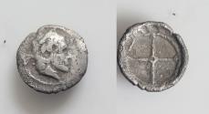 Ancient Coins - SICILY. Syracuse. Deinomenid Tyranny, 485-466 BC. Litra (Silver, 10 mm, 0.54 g). Diademed head of Arethusa to right. Rev. Wheel with four spokes.