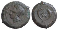 Ancient Coins - SICILY, Syracuse. Dionysios I. 405-367 BC. Æ Drachm (30-34mm, 34,16g). Head of Athena left, wearing Corinthian helmet with neck guard  / Sea-star between two dolphins.