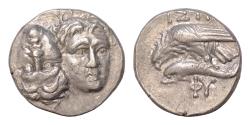 Ancient Coins - MOESIA, Istros. Circa 4th Century BC. AR 18mm Drachm (5.53gm). Facing male heads, the right inverted / Sea-eagle left, grasping dolphin with talons