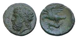 Ancient Coins - SICILY, Akragas. Circa 338-317 BC. Æ18mm Litra (3.7gm). Laureate head of Zeus left / Eagle standing left on hare, head lowered.