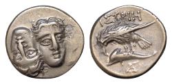 Ancient Coins - MOESIA, Istros. Circa 4th Century BC. AR 18mm Drachm (5.06gm). Facing male heads, the right inverted / Sea-eagle left, grasping dolphin with talons; between dolphin and eagle.