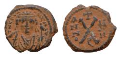 Ancient Coins - Maurice Tiberius. 582-602. Æ Decanummium (18mm, 2.5 g,). Theoupolis (Antioch) mint.  Crowned facing bust, with trefoil ornament, wearing consular robe