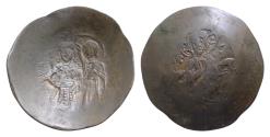 Ancient Coins - Manuel I Comnenus. 1143-1180. BI Silvered aspron trachy 29mm, 3,7g, Christ, nimbate, seated facing on backless throne wearing pallium and colobium and holding book of Gospels