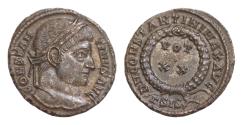 Ancient Coins - Constantine I the Great (307/10-337 AD.) AE Follis (18mm, 3g.) Siscia. CONSTANTINVS AVG. Laureate head right. Rev. D N CONSTANTINI MAX AVG / Γ SIS (sun). VOT / XX