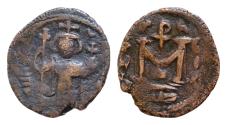 World Coins - ISLAMIC. Arab-Byzantine (Circa 685-692). Fals. Hims (Emesa). Crowned and draped imperial bust facing, holding globus cruciger.  Large M.