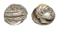 Ancient Coins - Phoenicia, Arados (c. 380-350 BC), Obol; AR (0,5g; 8,5 mm) Laureate head of marine deity r.; Rv. Galley r., double line of waves below, Phoenician legend above