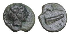 Ancient Coins - Sicily, Herakleia Minoa Æ 15mm. 3,1g Circa 307/5 BC. Head of Herakles to right, wearing lion skin headdress / Bow and quiver;