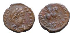 Ancient Coins - Arcadius. (383-408 AD). Æ 14mm 2,4g Follis. Antioch . Obv: ARCADIVS PF AVG. pearl-diademed bust of Arcadius right. Rev: GLORIA ROMANORVM. Arcadius on horseback riding right.  Extre