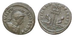 Ancient Coins - Crispus, Caesar (AD 316-326). Follis (AE, 19 mm, 3,1g) AD 320-321, Londinium. London mint VIRTVS EXERCIT Vexillum inscribed VOT / XX between two seated captives; in exergue PLN.