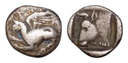 Ancient Coins - THRACE, Abdera. Circa 395-360 BC. AR Diobol (13mm, 1.58 g, ). ? magistrate. Griffin springing left / Bull head left within incuse square