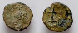 Ancient Coins - Marcian. A.D. 450-457. AE 8.5mm, 0,5g  Antioch mint. D N MARCIANVS P F AVG, diademed, draped and cuirassed bust bust of Marcian right; above, cross / Cross within wreath ,