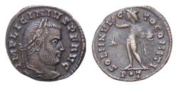 Ancient Coins - Licinius I (308-324) - AE19mm 2,7g Follis Ticinum P.T Laureate head right / Sol standing left with globe, star in field left, P.T in ex. (RIC 22) Extremely Fine