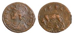 Ancient Coins - Commemorative Series, 330-354. Follis  14 mm, 1,7 g, ,  330-333. VRBS ROMA Helmeted and mantled bust of Roma to left.   She-wolf standing left, suckling Romulus and Remus;