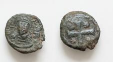 Ancient Coins - JUSTINIAN I (527-565).  AE 16mm 3,6g. Decanummium. Uncertain mint,  helmeted and cuirassed bust  Facing  , Large  X  between Four  stars  .