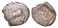 Ancient Coins - DYNASTS OF LYCIA. Uncertain dynast, circa 450 BC. Stater (Silver, 20 mm, 8,35g). Lion standing to left, devouring leg of a bull. Rev. Triskeles within square incuse.