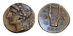 Ancient Coins - LUCANIA. Thourioi. Circa 280-213 BC. AE Bronze 14 mm, 2,5g, struck under the magistrate Sophi... Laureate head of Apollo to left; behind, monogram of AP.