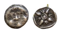 Ancient Coins - ASIA MINOR, Uncertain. 5th century BC. AR (8mm, 0.7 g). Gorgoneion / Stellate pattern within incuse square.
