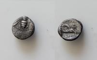 Ancient Coins - IONIA, Ephesos. Circa 500-420 BC. AR Hemiobol 6.5mm, 0,32g, 11h). Bee, tendrils above / Eagle head right; EΦ; all within incuse square