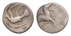 Ancient Coins - Peloponnesos. Sikyonia, Sikyon. Circa 431-400 BC. AR Hemidrachm (16mm. 2,56g.). Lion at bay left on ground line. Rev. Dove flying right.