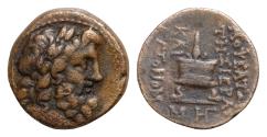 Ancient Coins - Cilicia, Mopsos. Ca. 164-27 B.C. Æ (20 mm, 8g,). Laureate head of Zeus right / [M]OΨEATΩN THΣ IEPAΣ KAI [A]YTONOMOY, lighted altar; below, MH and HΓ monograms